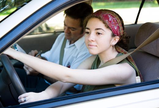 The DMV administers tests to new drivers before issuing a license.